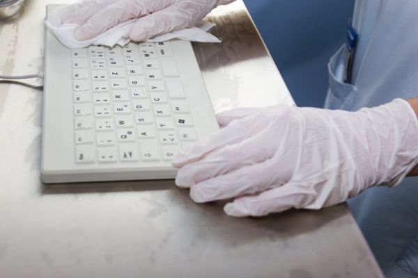 silicone keyboard being disinfected